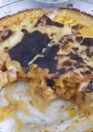 صورة لوصفة غراتان بطاطا بصوص تومات (طماطم) وبيشاميل