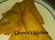 A picture of samosa with egg