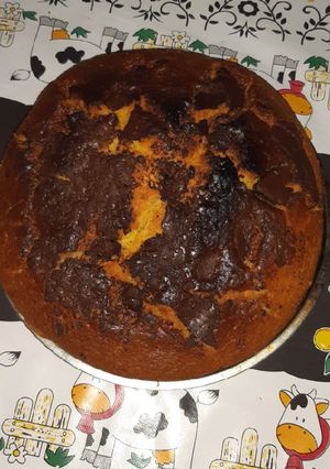 Una foto de Bizcochuelo🥧 en licuadora de mandarina 🍊y chocolate 🍫