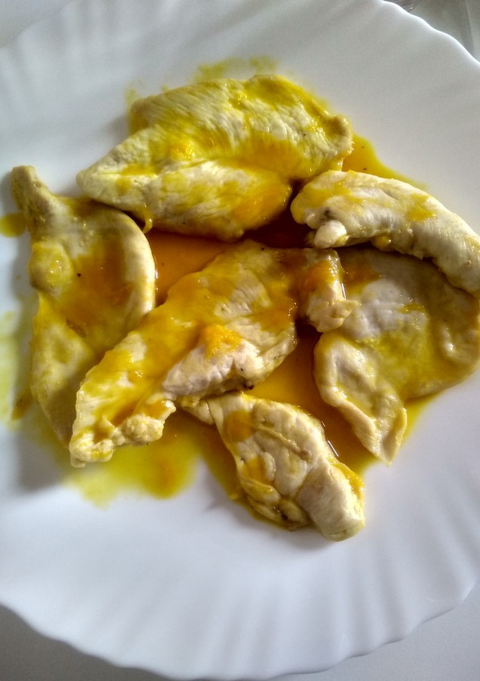 Una foto de Pechugas a la plancha con naranja