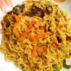 A picture of Noodles with veggies.