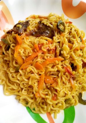 A picture of Noodles with veggies.
