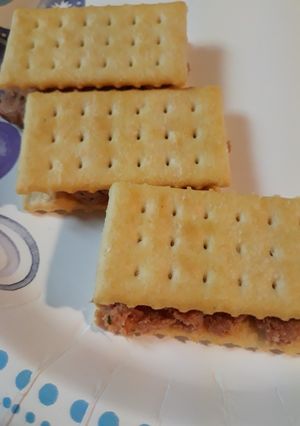 A picture of Butter Crackers with Deviled Ham.