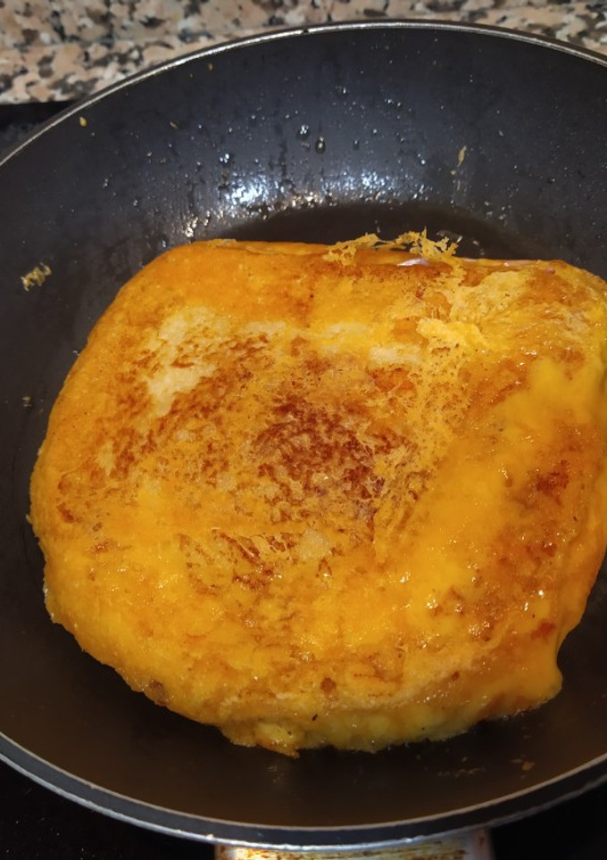 Una foto de Sándwich mixto con costra de cheddar