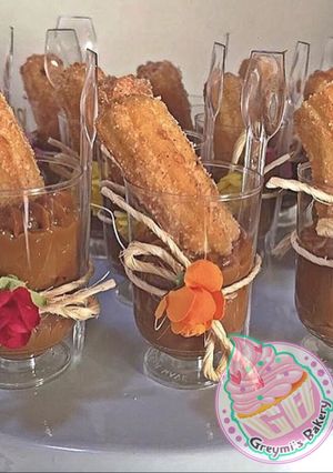 Una foto de Shots de churros con dulce de leche