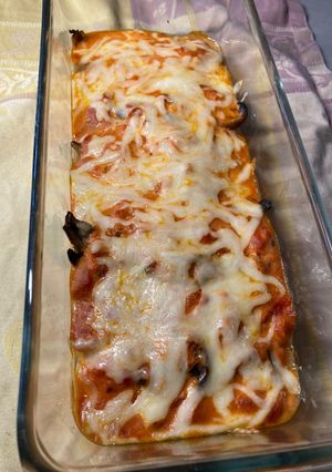 A picture of Baked Plain Quenelles with Tomato and Mushrooms.