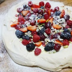 A picture of Pavlova with summer fruit.