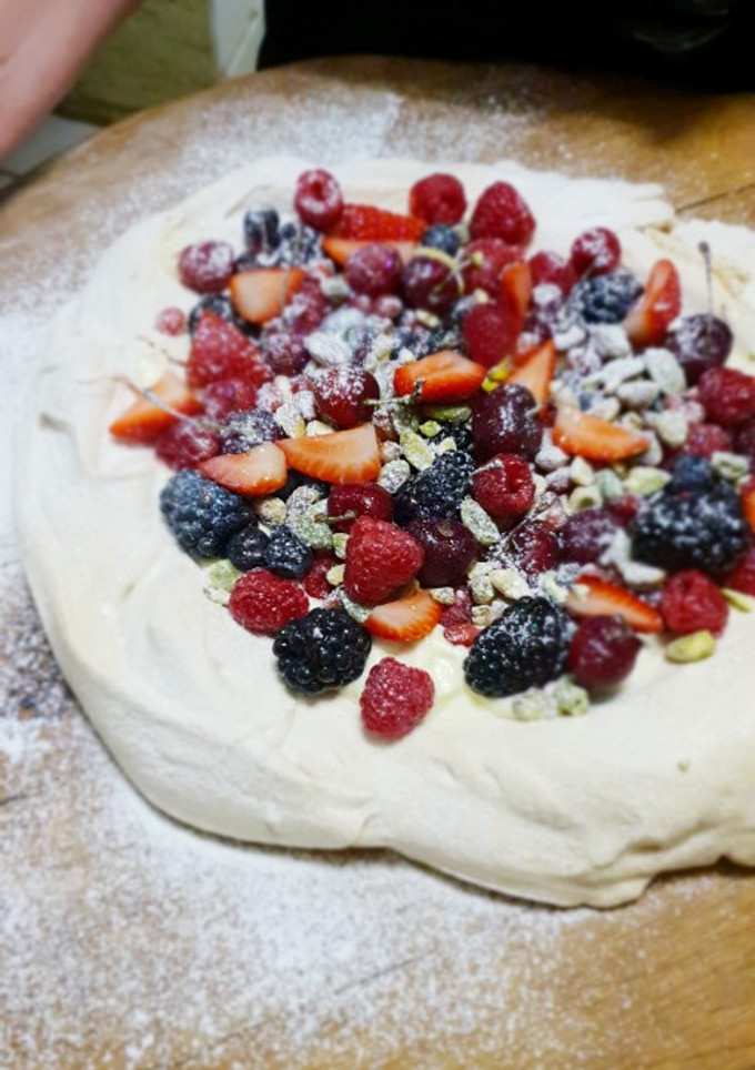 A picture of Pavlova with summer fruit.
