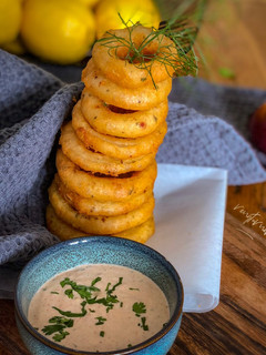 A picture of Beer battered onion rings.