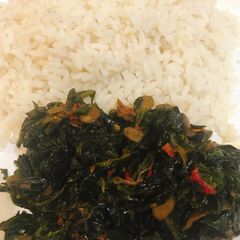 A picture of Vegetable sauce/rice.