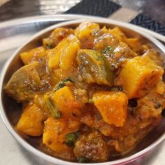 A picture of Brinjal potato mint masala.