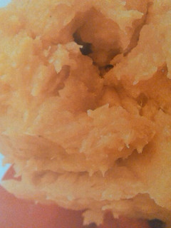 Una foto de Puré frito de papas con tomate