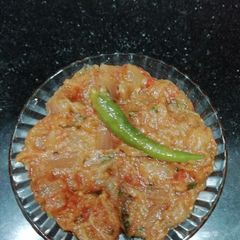 A picture of Bharta Eggplant grilled minced and roasted with spices.