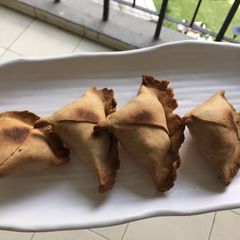 A picture of Baked whole wheat samosa.