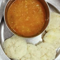 A picture of Sambar with idli.
