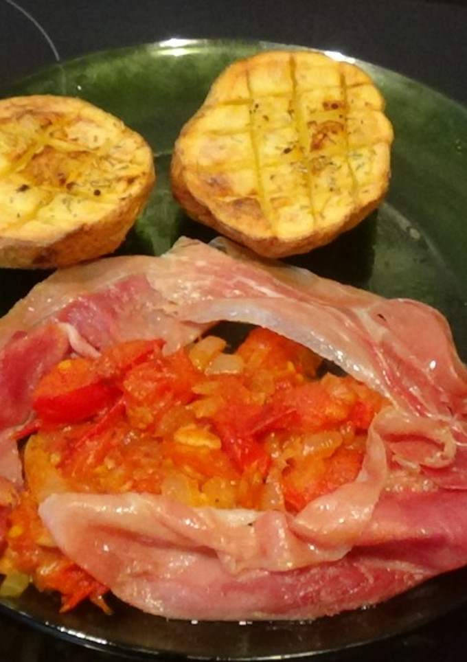 Una foto de Magras con tomate