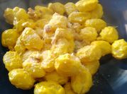 Una foto di gnocchi pancetta