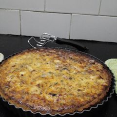 A picture of Chicken Mashroom smoked cheese quiche.