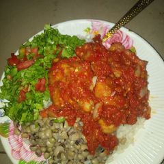 A picture of Rice beans en stew wiv salad.
