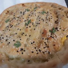 A picture of Qeema naan.