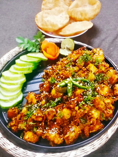 आलू तिल चटपटी रेसिपी मुख्य फोटो