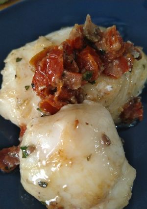 A picture of Monkfish Cheeks with Basil and Sun-Dried Tomato.