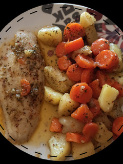 Una foto de Panga al horno con verduras