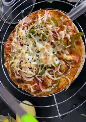 A picture of Chapati cheese burst pizza rotzza.