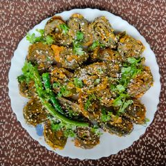 A picture of Gujrati patra or maharashtrian alu wadi.