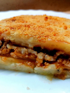 Una foto de Puré de patata relleno de carne
