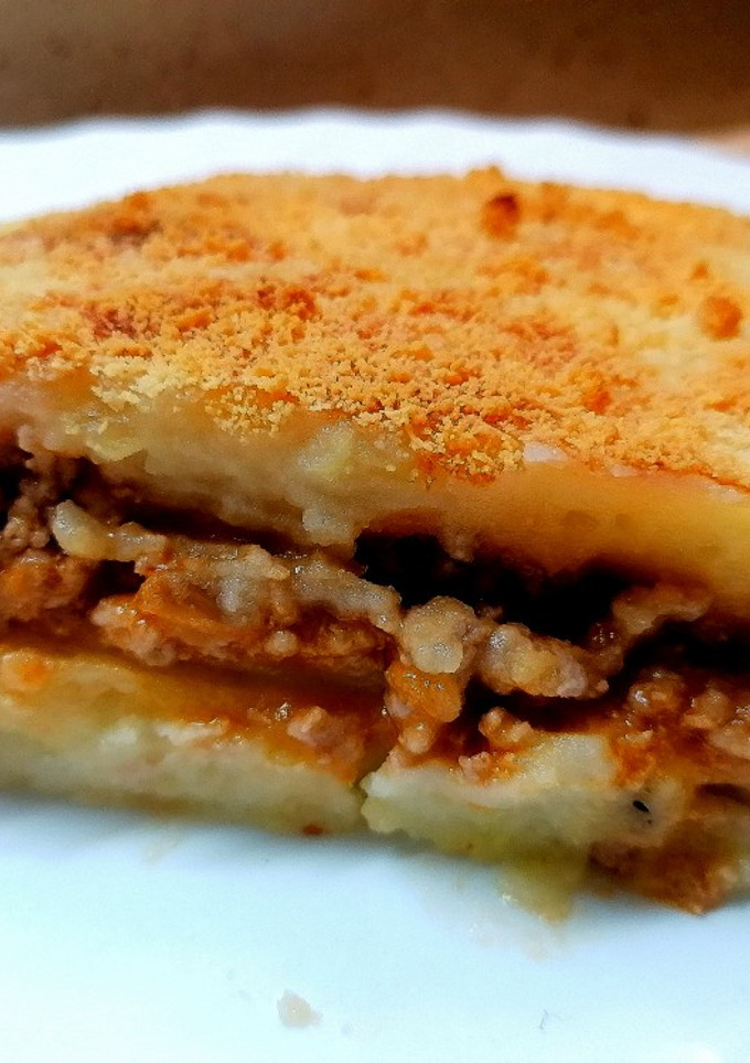 Una foto de Puré de patata relleno de carne