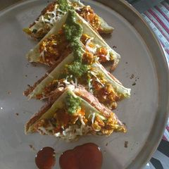 A picture of Open cheese sandwich.