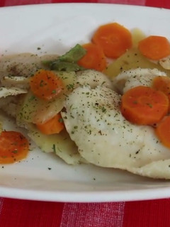 Una foto de Merluza en papillote