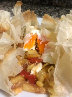Una foto de Saquito de patatas con pimientos al roquefort