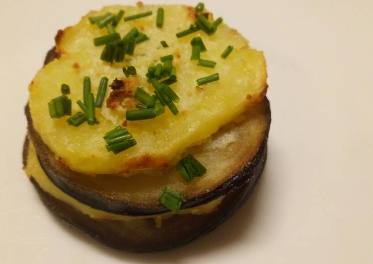 Aubergine and potato stack with garlic and herb cheese