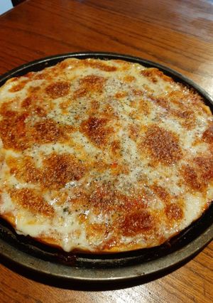 Una foto de Pizza 4 quesos