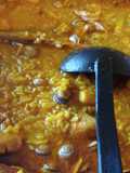 Arroz amb brou de marisc, caragols, gambons i Pop. Amb Marisc.Arroz meloso marisco pulpo y caracoles
