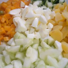 A picture of Cucumber and carrots salad.