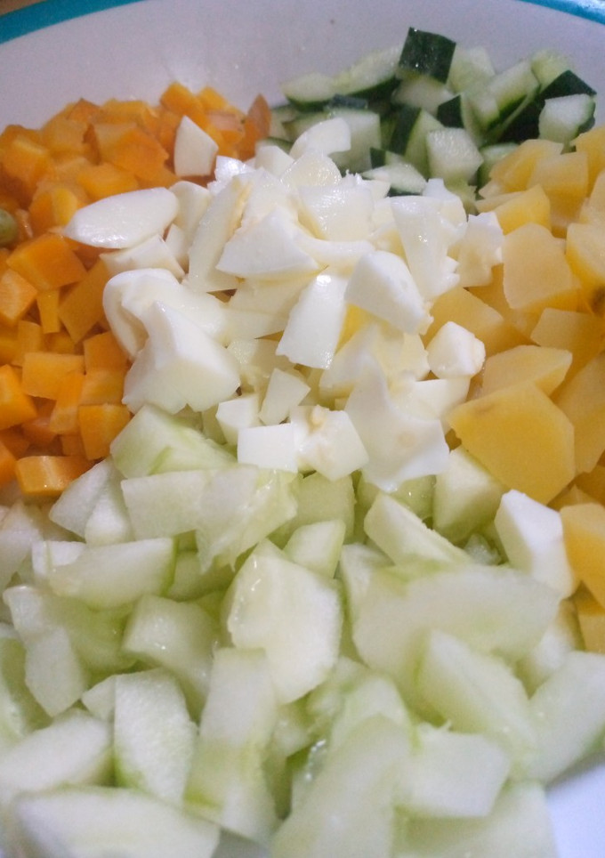 A picture of Cucumber and carrots salad.
