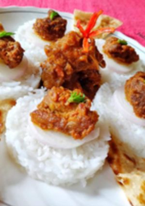A picture of Mutton rice tikki with naan.