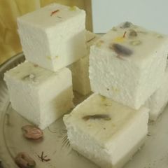 A picture of Spoiled milk steamed Barfi (Sweet).
