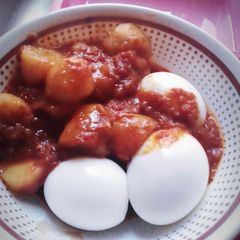 A picture of Irish Potatoes sauce & egg.