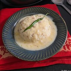 A picture of Gujarati Kadhi With Steamed Rice.