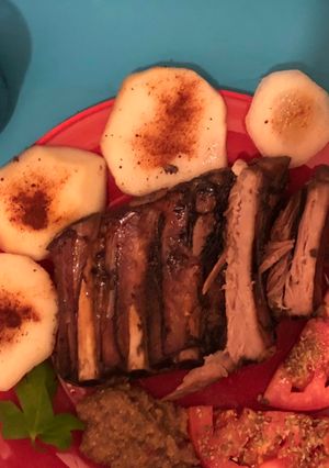 Una foto de Pechito de cerdo en salsa roja malbec