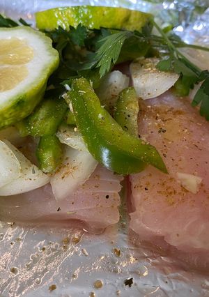 Una foto de Pescado al Horno con Verduras