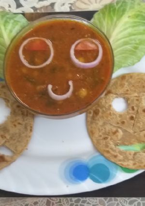 A picture of Chole with smily puri.