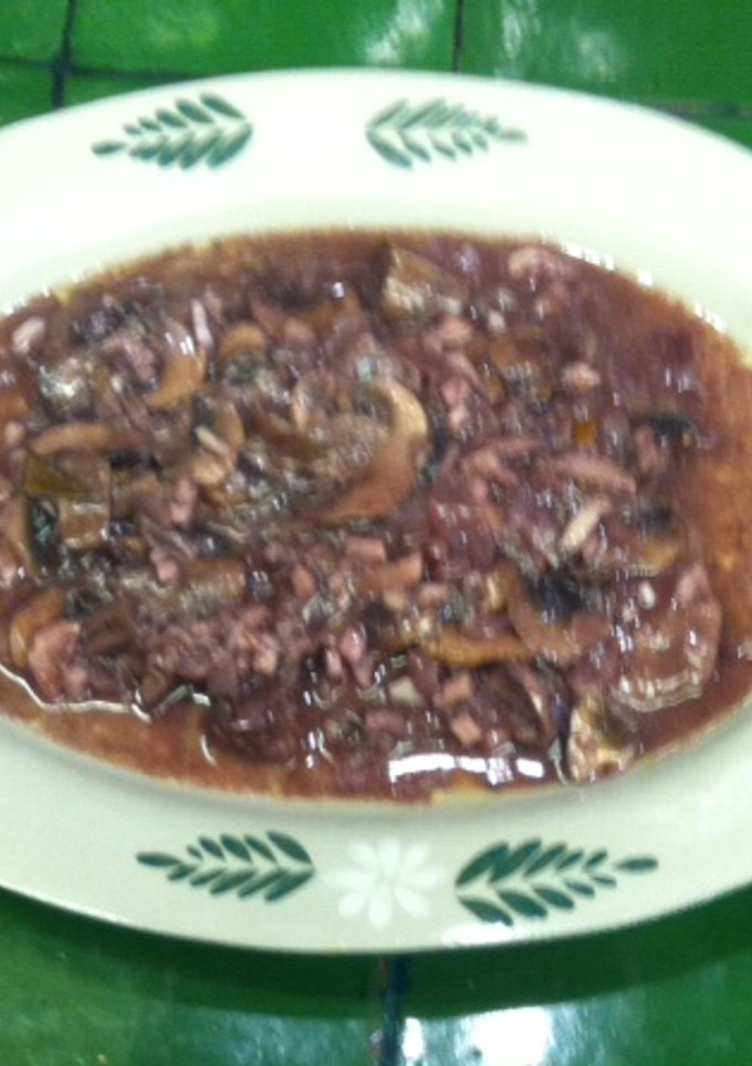 Una foto de Filetes con champignons al vino tinto ©