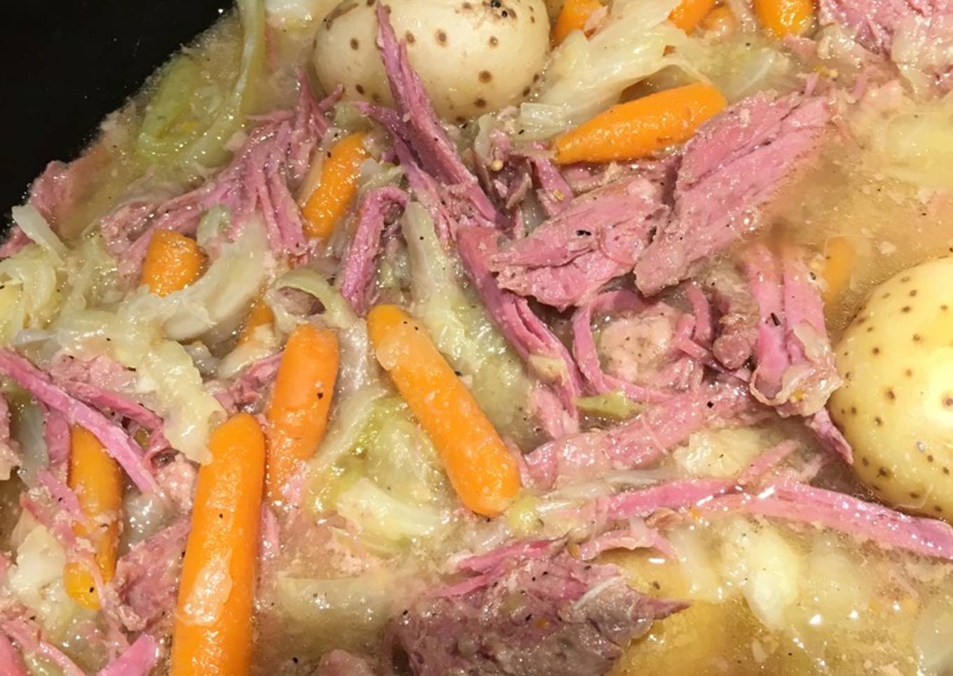 Multicooker with corn, beef and cabbage