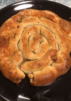 Une photo de Escargot feuilleté portionnable aux saucisses, tapenade noire et emmental