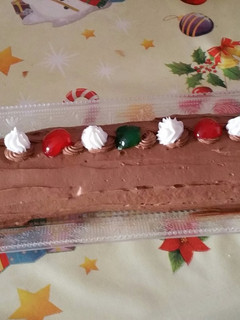 Una foto de Brazo de gitano relleno de trufa